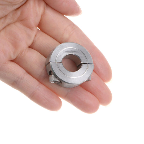 Hand holding Two Piece Split Shaft Collar Clamp On For 1/2 Inch Shafts, 1-1/8 Inch Outer Diameter, 13/32 Inch Width, 304 Stainless Steel