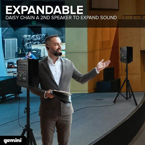 Man using UHF Wireless Mic System For Teaching And Events With Dual Lavalier And Headset Mics on stage with speakers