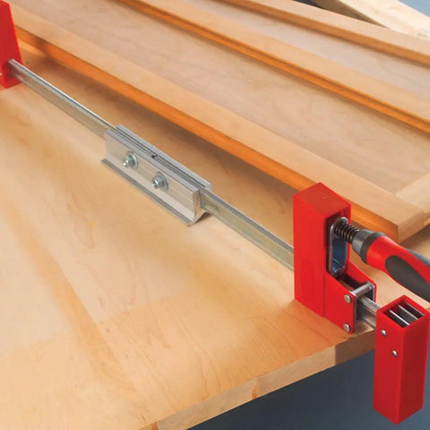 Set Of Two KBX20 K Body Clamp Extenders For Wider Opening Heavy Duty Aluminum Link With Included Bolts Nuts And Washers Built To Deliver Stable No Wobble Performance On Serious Woodworking Projects on wooden surface.