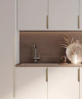 Modern kitchen with Aluminum Alloy Brushed Bronze Cabinet Pulls 39.37in Hidden Finger Edge Pulls on white cabinets, side view.