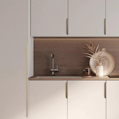 Modern kitchen with Aluminum Alloy Brushed Bronze Cabinet Pulls 39.37in Hidden Finger Edge Pulls on white cabinets, side view.