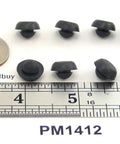 Ridged SBR Rubber Push In Bumper One Half Inch Diameter Five Thirty Second Inch Height Fits One Quarter Inch Hole shown with ruler