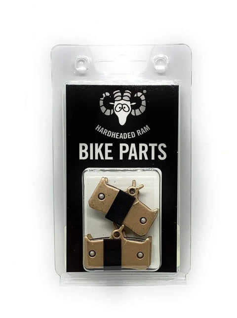 Heavy Duty Sintered Metal Disc Brake Pads In Two Pairs, durable and heat resistant, packaged for Shimano Grimeca and Hope brakes.