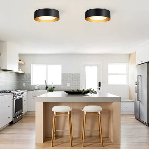 Modern Black And Gold Flush Mount Ceiling Light With Glass Drum Shade Close To Ceiling Round Fixture in kitchen setting