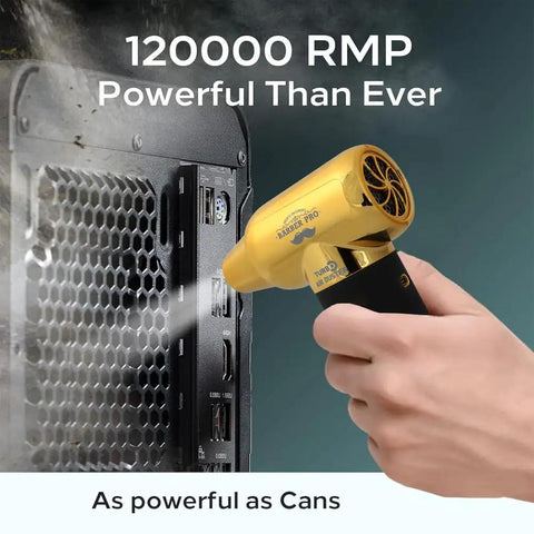 Hand holding High Power Electric Compressed Air Duster With 3 Gear Settings Mini Portable Jet Dry Blower in use on computer.