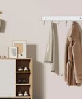 Two Pack Wall Mount Coat Rack With 12 Rotating 180 Degree Hooks 14.6 Inch Rustproof Wooden Entryway Organizer in white with coat and scarf