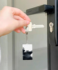 Hand holding key with Aircraft Carrier Acrylic Keychain Transparent and Durable Key Ring Charm for Vinyl Kits and Pendants