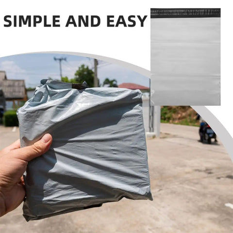 Hand holding a gray Waterproof Self Sealing PE Shipping Bag For Clothing And Shoes, 100 Pack Durable Mailer Envelopes
