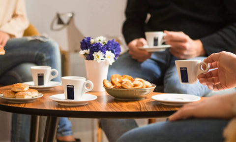 People enjoying coffee served with Blue Classy Mini Single Serve Espresso Machine With Two Cup Settings Simple Touch Controls.