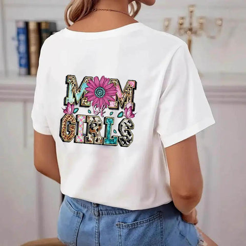 Woman wearing white T-shirt with "Mom of Girls" floral leopard design, part of Four Pack Iron On Transfers For T Shirts DTF Ready To Press