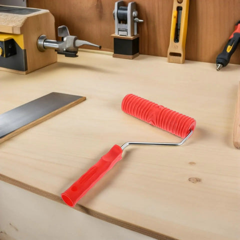 Knockout 2 Piece Wood Grain Texture Paint Roller Pair Featuring Rock Solid Grip Handle For Quick Drywall Mud Work and Real Deal Fake Timber Finish Results That Truly Stand Out on workshop table.