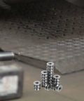 20 Pack V Groove Pulleys For Gate Tracks With Deep Groove Ball Bearings arranged on surface, showcasing heavy-duty design for smooth sliding.