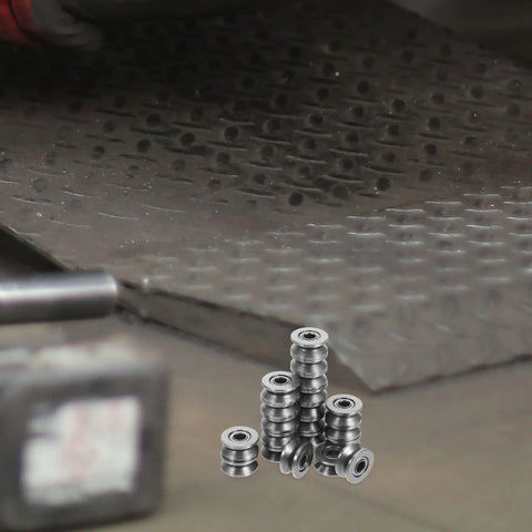 20 Pack V Groove Pulleys For Gate Tracks With Deep Groove Ball Bearings arranged on surface, showcasing heavy-duty design for smooth sliding.