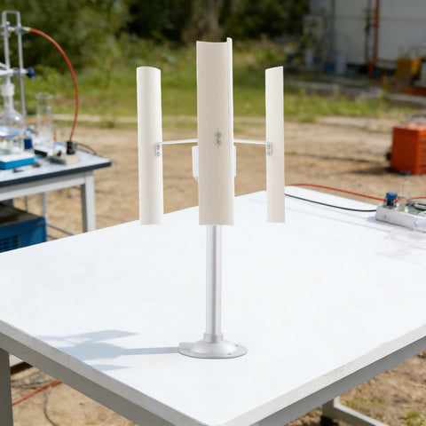 Three Blade Vertical Axis Wind Turbine Kit With 12V 40W 3-Phase Permanent Magnet Motor on a table, outdoor setting
