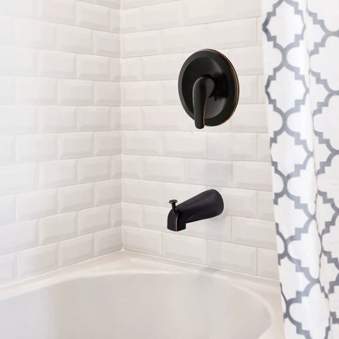 Middleton II Transitional Single Handle Shower Valve Trim with Escutcheon in oil rubbed bronze on white tiled wall above bathtub