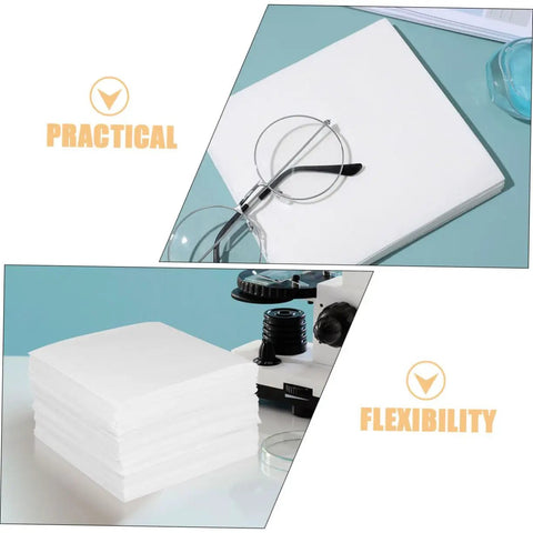 Heavy Duty 600 Count Dustless Lab Wipes For Camera Lenses And Precision Gear Oil Absorbent Cleanroom Cleaning Pads stacked with glasses and microscope.