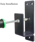 2x4 Door Barricade Brackets Build Rock Solid Security With A Sturdy U Shaped Metal Bar For Homes Garages Basements Sheds Warehouses And Backyards Keeps Doors Locked Down Against Break Ins being installed with screwdriver
