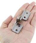 Torque Shaft Hinge Set With Adjustable Damping in hand, showing small metal damper hinge with stainless steel build for smooth operation