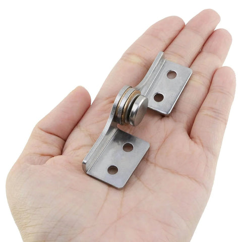 Torque Shaft Hinge Set With Adjustable Damping in hand, showing small metal damper hinge with stainless steel build for smooth operation