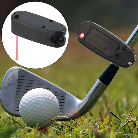 Premium Golf Putter Laser Pointer Putting Trainer Aim Line Corrector on golf club aiming at a golf ball on grass.