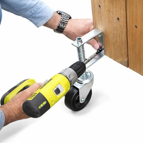 Installing Heavy Duty 4 Inch Spring Loaded Gate Caster Wheel with drill on wooden gate for automatic height adjustment.