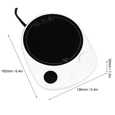 This Solid Electric Mug Warmer Boasts Four Heat Presets To Keep Your Daily Brew Piping Hot All Day Long Featuring Smart Auto Shut Off Protection And Fast Heating With A Sleek White Top For Desk Setup, showing 6.4 x 5.4 inch black tempered surface.