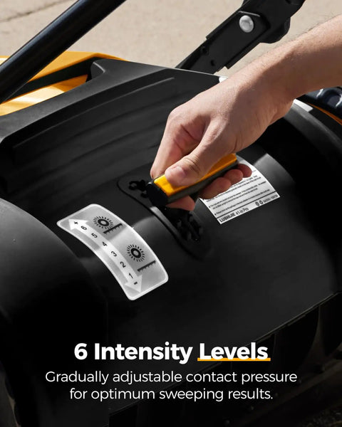 Adjustment dial for 6 intensity levels on Kick Serious Dust With This Heavy Duty Manual Floor Sweeper Designed For Warehouses And Shops Featuring A 41 Inch Wide Commercial Push Broom That Runs Whisper Quiet And Cuts Through Grit Fast.