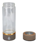 Keep It Fresh And Locked In With This Portable Hydrogen Water Bottle Featuring USB Rechargeable Tech And Stainless Steel Build For Antioxidant Rich Hydration At The Gym Or Office All Day Long - clear glass bottle and base.