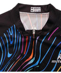 Close-up of black cycling jersey with colorful stripe pattern, zipper front, and Miloto logo on chest