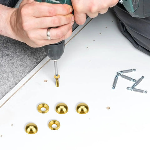 Person using a drill to install Top Shelf Vintage Style Brass Screws With Flush Caps on wooden project, showing 15mm screws.