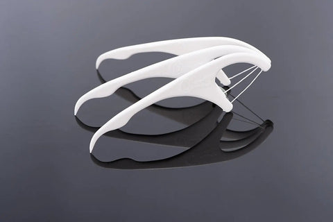 Daily Dental Floss Picks Individually Wrapped 350 Count with Easy Glide Floss displayed on reflective surface