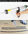 Pneumatic Caulking Gun 20 Oz Sausage, Aluminum Cylinder, 600 mL Capacity in use on cardboard with dripless air powered tool