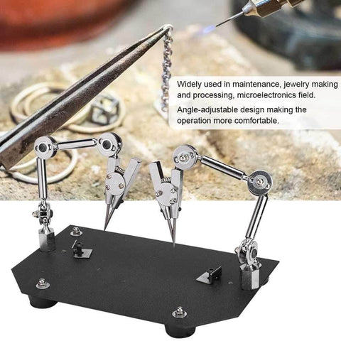 Pro Grade Sturdy Welding Table Clamp with 360 Degree Adjustable Arms, shown on workbench, for soldering and repairing tasks.