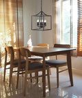 Dining room with Six Light Black Modern Farmhouse Square Pendant Chandelier For Foyer Hallway Stairway Kitchen Island Dining Living Room 15.75 Inch Wide 22.4 Inch High With 35.4 Inch Chain Length above table.