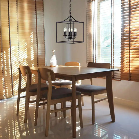 Dining room with Six Light Black Modern Farmhouse Square Pendant Chandelier For Foyer Hallway Stairway Kitchen Island Dining Living Room 15.75 Inch Wide 22.4 Inch High With 35.4 Inch Chain Length above table.