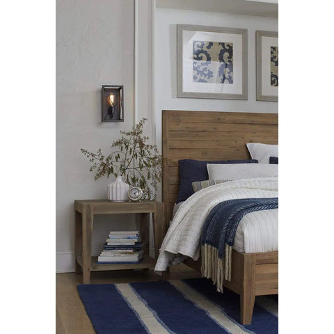 Bedroom with Briarwood Antique Bronze One Light Wall Sconce With Faux Wood Look Farmhouse Architectural Lighting above nightstand