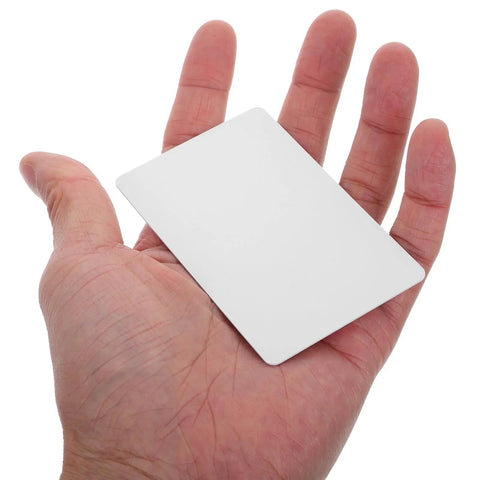 Straight Up Premium White Pvc Cards Bulk Pack Standard Eighty Five By Fifty Four Millimeter Size shown in hand for double sided ID printing.