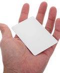 Twenty Premium White Pvc Id Card Blanks Standard Cr80 profile held in a hand, showcasing size and smooth surface for easy printing.