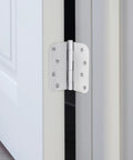 Heavy Duty 4 Inch Interior Door Hinges White Steel 3 Pack Smooth Swinging Removable Pin installed on a door frame