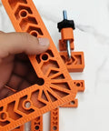 Killer Adjustable Seven Piece Right Angle Clamp Set Lightweight ABS Plastic Corner Clamping Kit for Smooth Woodworking in orange.