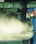 Worker wearing N95 Particulate Respirator With Adjustable Nose Clip And Two Strap Design Lightweight Disposable Mask during dust work