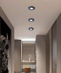8 Pack Sharp Brass Round Dimmable LED Recessed Downlights 7W Anti Glare 4.2 Inch Ceiling Fixtures in modern hallway.