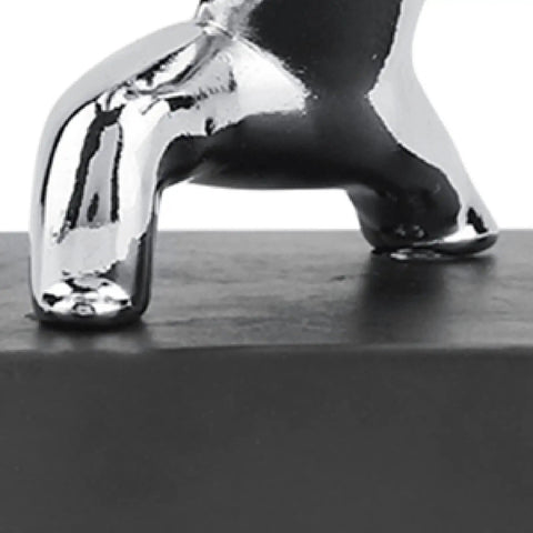 Durable Non Slip Door Stopper With Rubber Base For Child And Pet Safety, close-up of metallic decorative design.