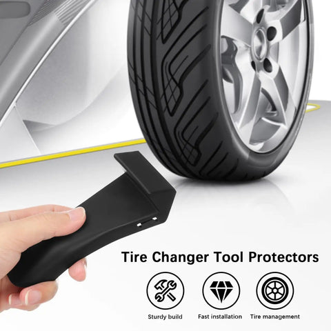 4 Pack Tire Changer Jaw Protectors Black Clamp Covers For Wheel Demount Machines Rim Safety Guards held next to car tire.
