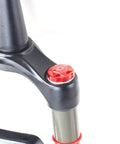 Bike Air Valve Top Cap Cover for Suspension Forks, CNC Machined Aluminum, shown installed on bike fork, red color option.