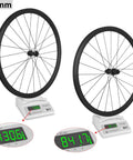 Road Ready Carbon Clincher Disc Wheelset For 700c Road Bikes Tubeless Compatible 32mm Rim Depth 24H showing weight on scale