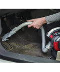 Compact 12V Flexi Automotive Vacuum With 4 Ft Hose Crevice Tool 2in1 Wide Nozzle And Flip Up Brush Corded Handheld Car Vacuum For Tight Spaces And Quick Cleanups Built For On The Go Cleaning Motor In The Filter Tech in use cleaning car floormat