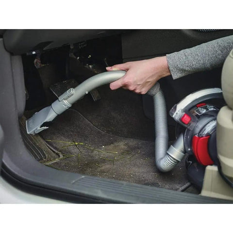 Compact 12V Flexi Automotive Vacuum With 4 Ft Hose Crevice Tool 2in1 Wide Nozzle And Flip Up Brush Corded Handheld Car Vacuum For Tight Spaces And Quick Cleanups Built For On The Go Cleaning Motor In The Filter Tech in use cleaning car floormat