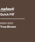 Quick Fill Burn In Stick Wood Filler In True Brown Shade for patching scratches on wood surfaces and furniture.