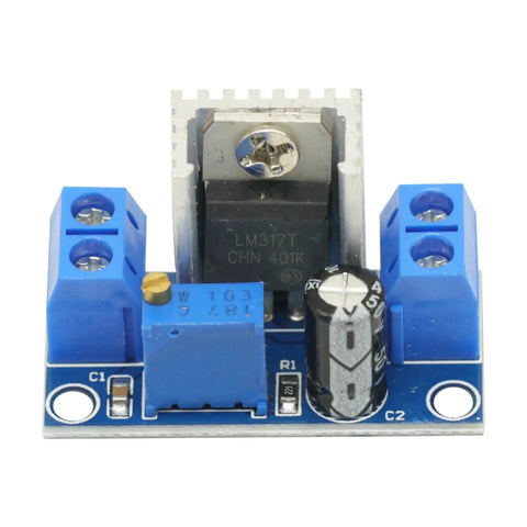 Close-up of Go-To Adjustable Voltage Regulator Power Supply Module from 4.2V-40V to 1.2V-37V, LM317 chip visible